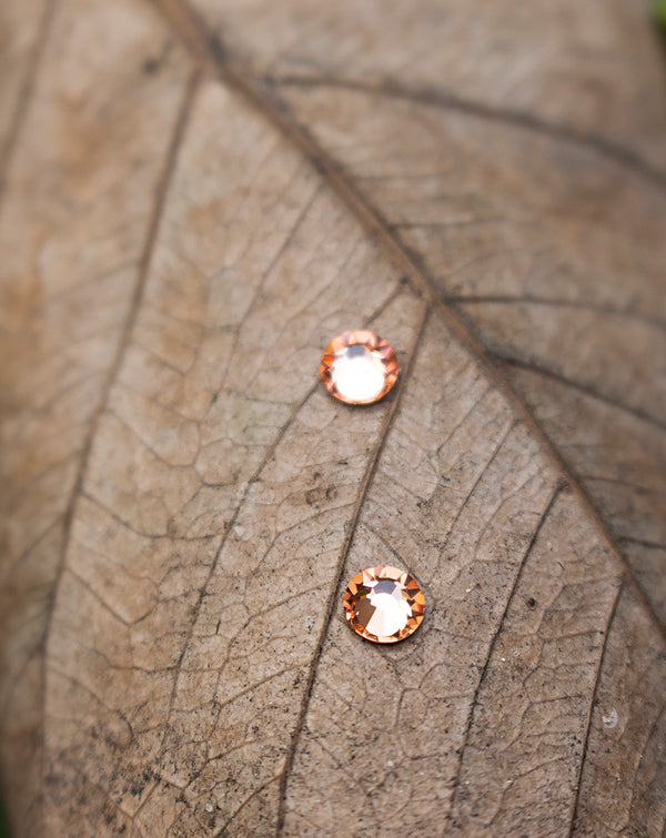 4.81 mm Round Shape Preciosa Crystal Hot Fix in Appricot color