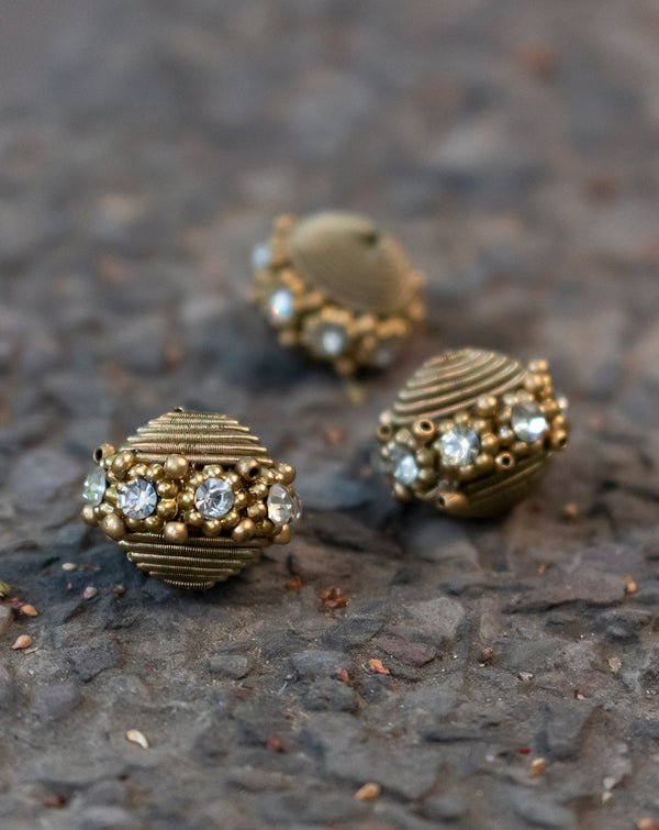 Round beads embellished with swarovski and dori-Golden