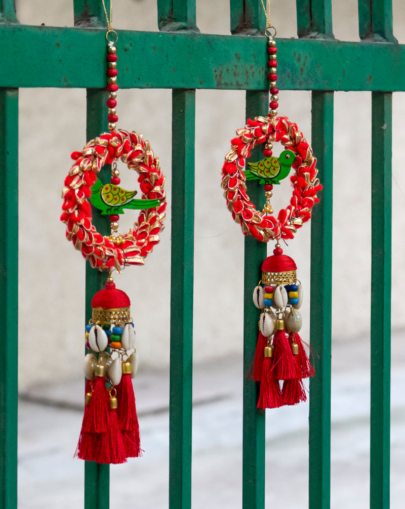 Hanging Designer tassel embellished in shells and parrot-Red