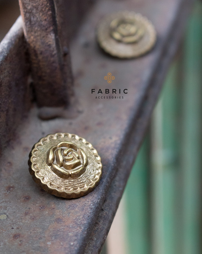 Plastic golden button with rose embossed